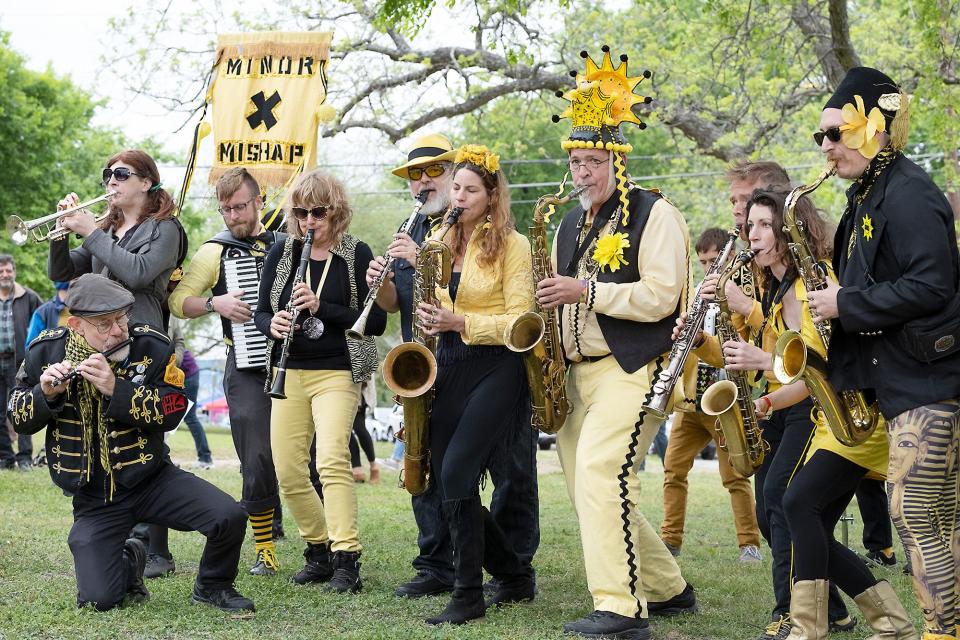 The Minor Mishap Marching Band from Austin, TX. performs in the East Arbor, a grassy park area off of W. 30th St. during the 2019 edition of HonkTX! The volunteer-run festival returns to Austin on April 5-7.