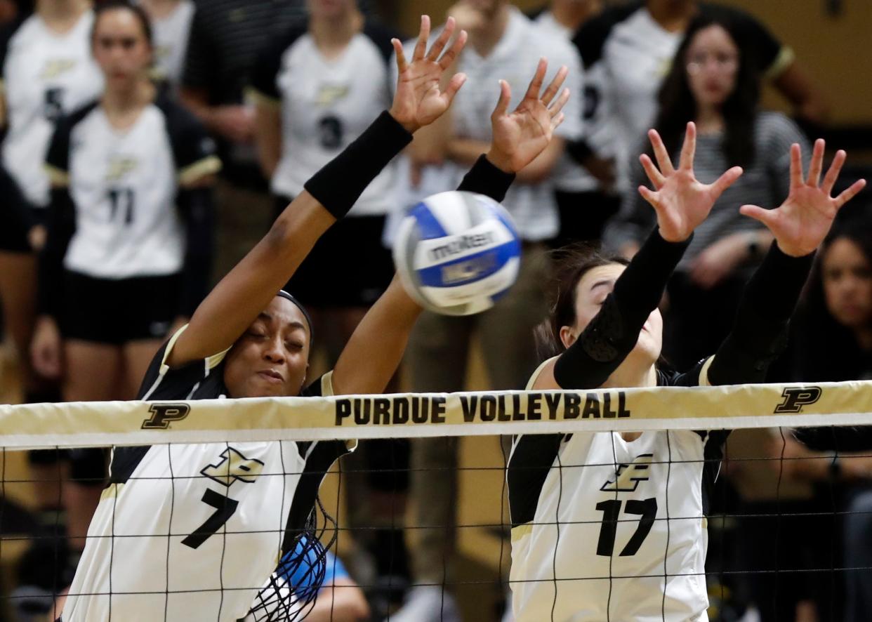 Purdue Boilermakers Raven Colvin (7) and Purdue Boilermakers Eva Hudson (17) defend a spike during the NCAA volleyball match against the Nebraska Cornhuskers, Wednesday, Oct. 19, 2022, at Holloway Gymnasium in West Lafayette, Ind. Nebraska won 3-0.