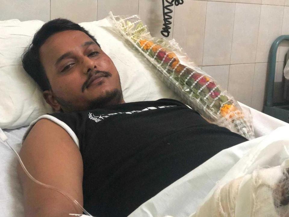 Muhammad Zubair, a survivor of the PK8303 plane crash, sits in a hospital bed as he recovers: Raza Hamdani/Ramisha Ali