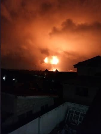 An explosion is seen after a natural gas station exploded in Ghana's capital Accra, in this image obtained from social media October 7, 2017. MANDATORY CREDIT @ronnieamofa/via REUTERS