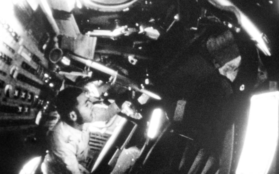 Anders looks out from Apollo 8 in 1968