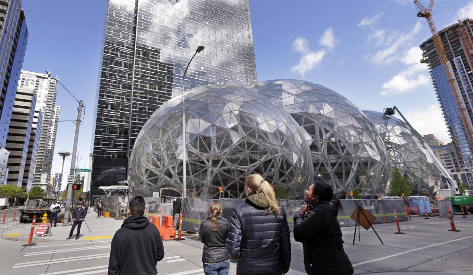 Although Amazon’s Seattle headquarters is already sprawling, the tech giant plans on opening a second headquarters elsewhere in the U.S. Source: AP Photo/Elaine Thompson