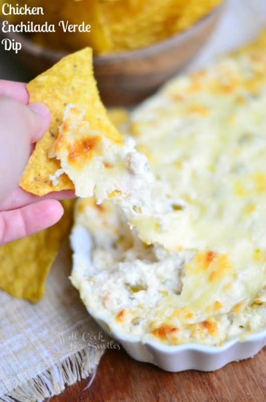 <p>Will Cook for Smiles</p><p>Hot dip made with all the wonderful flavor you get in Chicken Enchilada Verde! <a href="http://www.willcookforsmiles.com/2014/07/chicken-enchilada-verde-dip.html" rel="nofollow noopener" target="_blank" data-ylk="slk:Get the recipe HERE;elm:context_link;itc:0;sec:content-canvas" class="link rapid-noclick-resp">Get the recipe HERE</a>. </p>