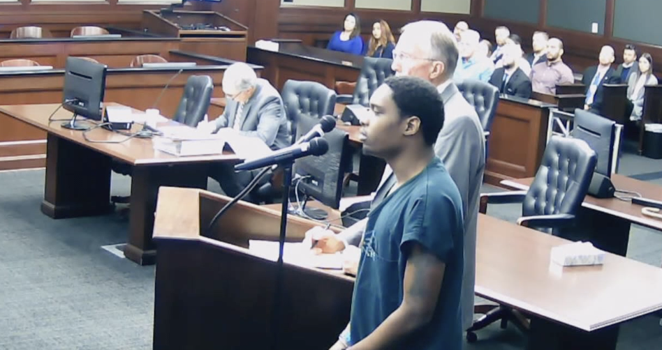 Tyree Leevon Parker listens to the judge sentencing him to life in prison for the 2021 shooting death of 26-year-old Caroline Schollaert who had caught him trying to break into her car.