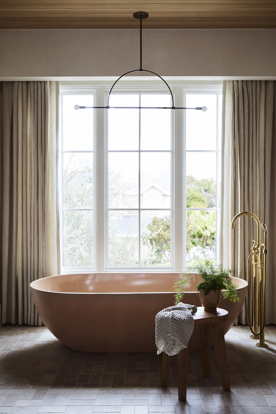 a large bathtub in a bathroom