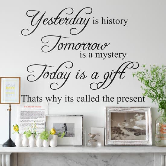 white room with wall quote and  pictures