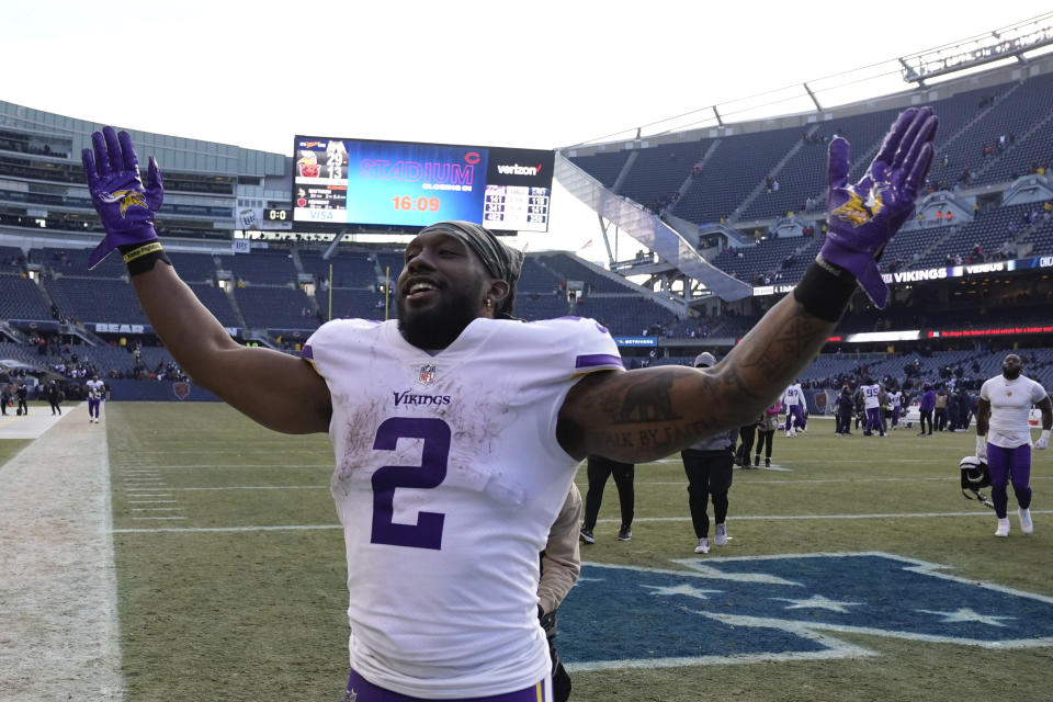 Minnesota Vikings running back Alexander Mattison celebrates after an NFL football game against the Chicago Bears, Sunday, Jan. 8, 2023, in Chicago. The Vikings won 29-13. (AP Photo/Charles Rex Arbogast)