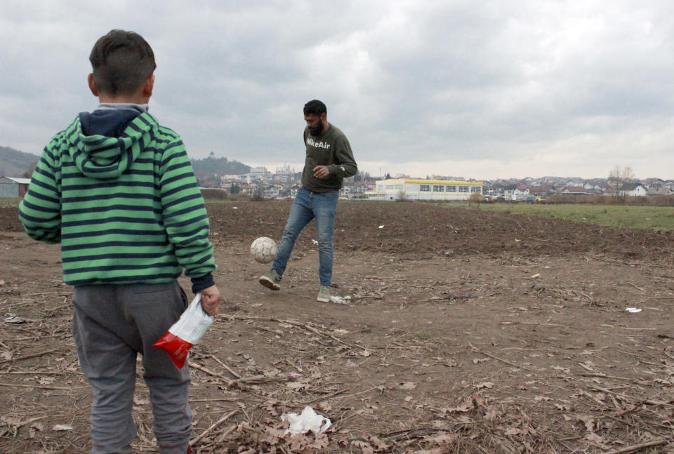 Ibrahim Rasool, Afghan refugee, formerly a FIFA-licensed futsal referee controls the ball at a makeshift camp housing migrants, in Velika Kladusa, Bosnia, Saturday, Nov. 13, 2021. Ibrahim Rasool loved his job as a futsal referee because of sportsmanship and fair play. But the 33-year-old man from Afghanistan says there is nothing fair about the way the European Union treats people seeking refuge from violence and war. (AP Photo/Edvin Zulic)