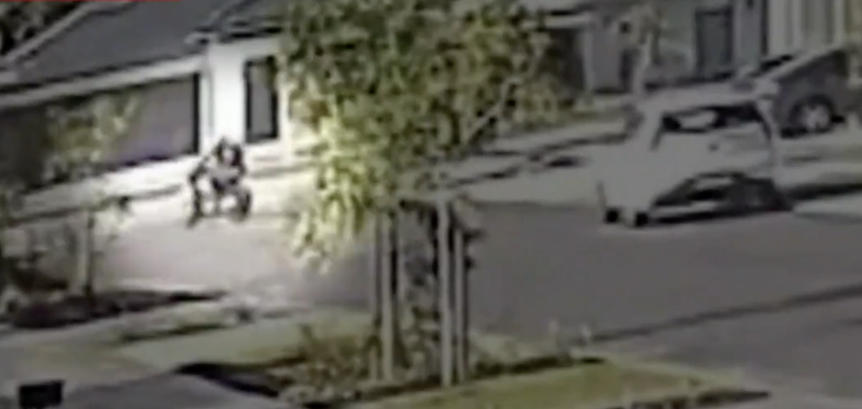 CCTV showing a man hop on a motorbike in the Perth suburb of South Guildford.