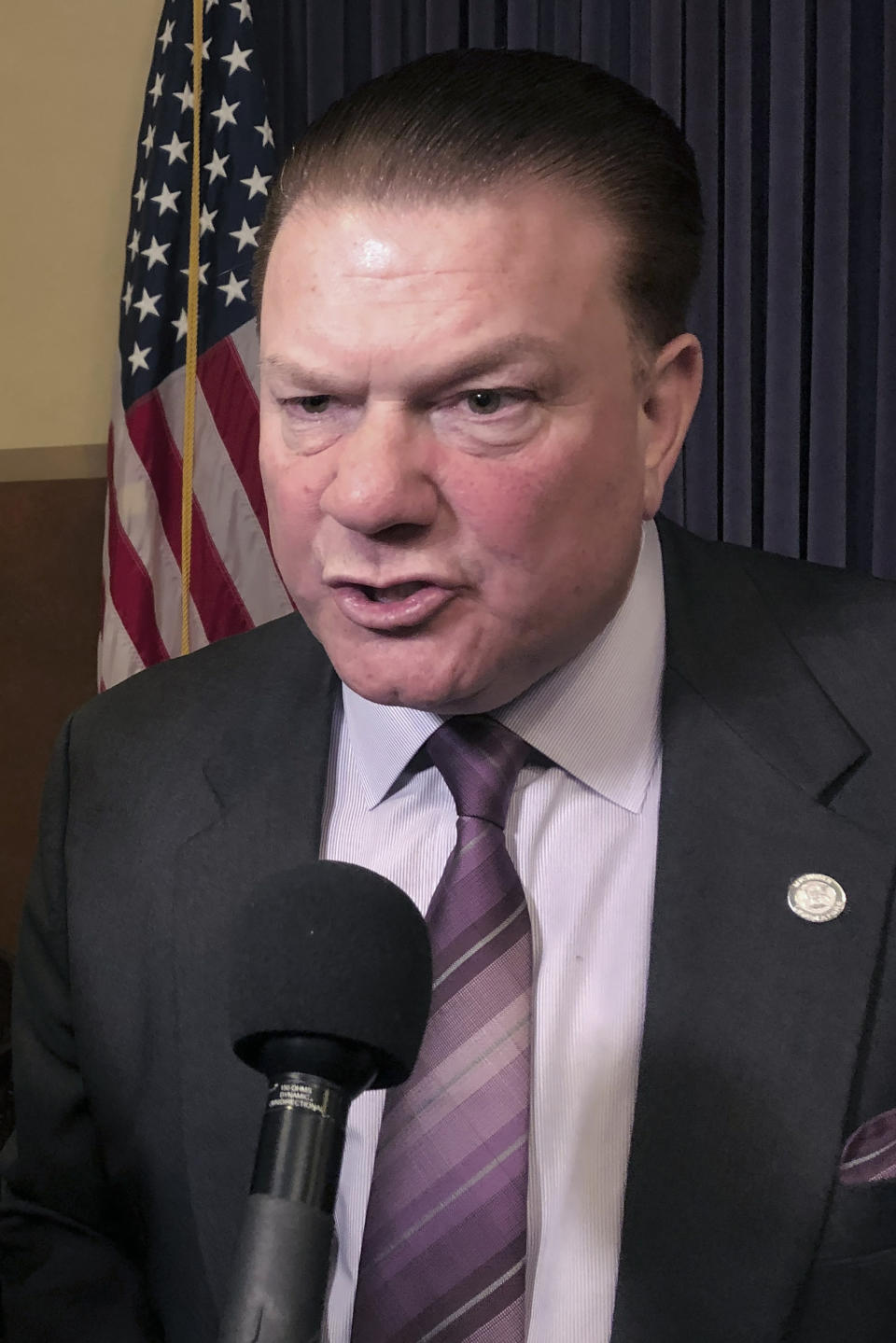 FILE - In this Feb. 20, 2019, file photo, State Sen. Peter Lucido, R-Shelby Township, speaks after a news conference at the Capitol in Lansing, Mich. State lawmakers across the U.S. have reached a troubling milestone for allegations of sexual misconduct. New complaints filed against Lucido have brought the total number of state legislators accused of sexual misconduct during the past three years to more than 100. (AP Photo/David Eggert, File)