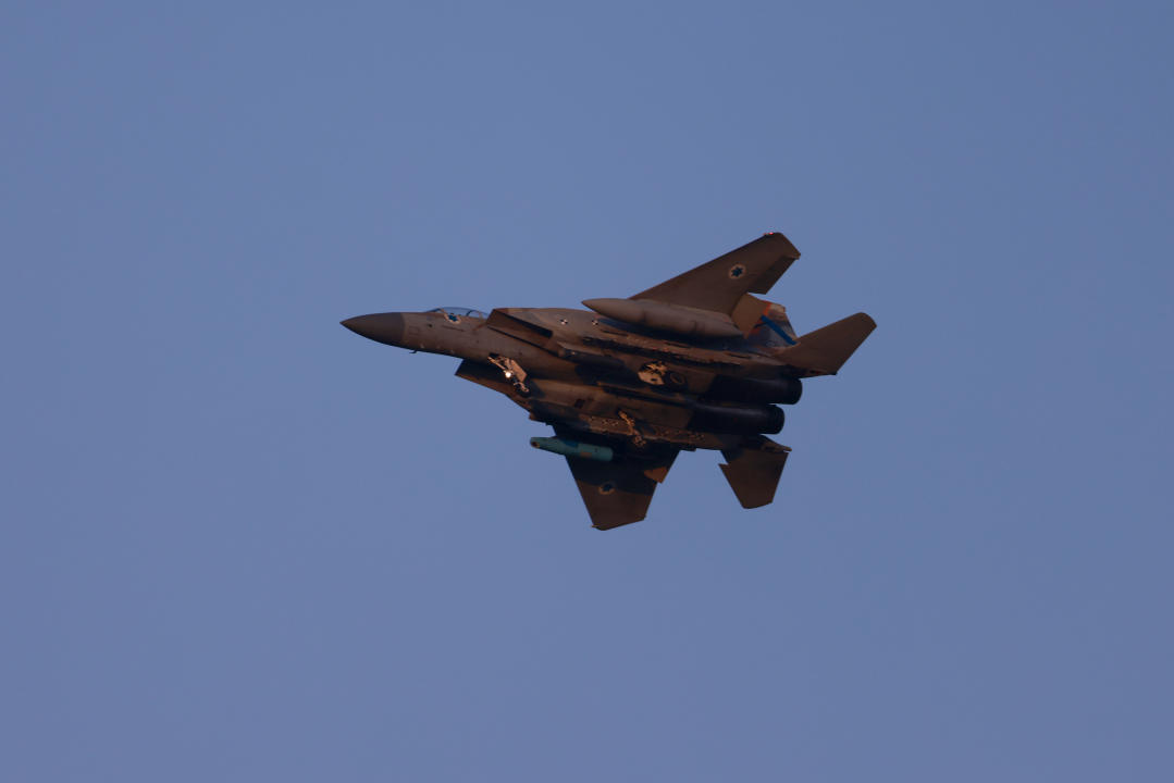 An Israeli army f-15 fighter jet flies over central Israel on April 15, 2024. (Photo by Menahem KAHANA / AFP) (Photo by MENAHEM KAHANA/AFP via Getty Images)