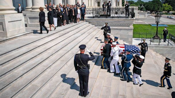 PHOTO: The flag-draped casket bearing the remains of Hershel W. Williams is carried by joint service members into the U.S. Capitol, to lie honor, on July 14, 2022 in Washington, D.C. (Al Drago/POOL/AFP via Getty Images)