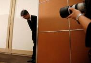 Kobe Steel Executive Vice President Naoto Umehara bows as he arrives at a news conference in Tokyo, Japan October 20, 2017. REUTERS/Issei Kato