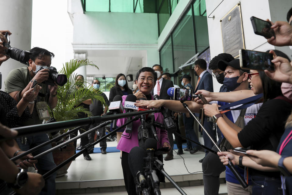 Filipino journalist Maria Ressa, one of the winners of the 2021 Nobel Peace Prize and Rappler CEO, speaks to the media after a court decision at the Court of Tax Appeals in Quezon City, Philippines Wednesday, Jan. 18, 2023. The tax court on Wednesday cleared Ressa and her online news company of tax evasion charges she said were part of a slew of legal cases used by former President Rodrigo Duterte to muzzle critical reporting. (AP Photo/Basilio Sepe)
