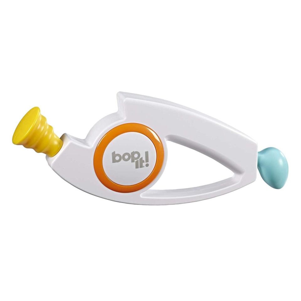 <a href="https://amzn.to/2sn0mbJ" target="_blank" rel="noopener noreferrer">A Bop It!﻿</a> will not only bring a healthy dose of nostalgia to the party, it will probably provide another activity for when the gift exchange is finished.