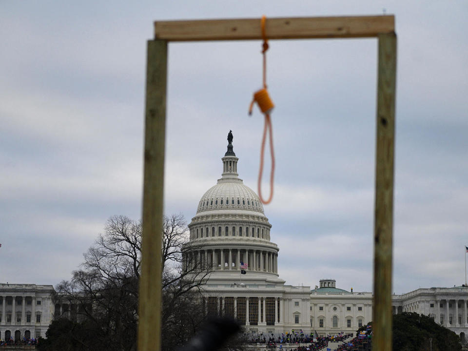 A noose is seen on makeshift gallows as supporters of President Donald Trump stormed the U.S. Capitol in an attempted coup, in Washington, D.C., January 6, 2021.    / Credit: ANDREW CABALLERO-REYNOLDS/AFP via Getty Images