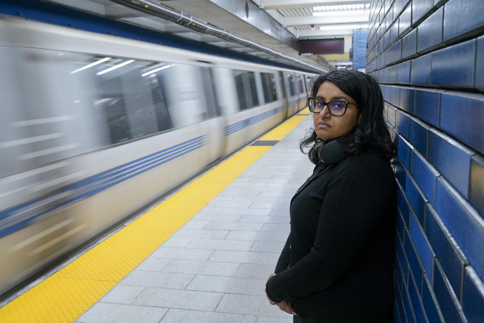 Sadaf Zahoor stands in a Bay Area Rapid Transit station Wednesday, June 7, 2023, in Oakland, Calif. Zahoor has used public transit her whole life and relies on it to get to work. (AP Photo/Godofredo A. Vásquez)