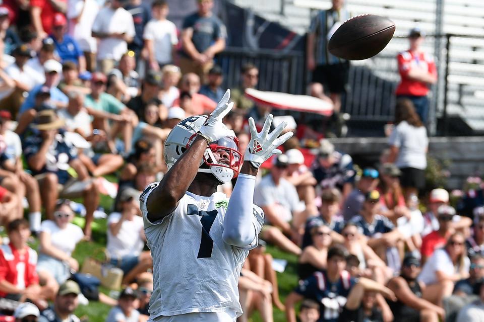 Patriots wide receiver JuJu Smith-Schuster, a free-agent signing during the offseason, makes a catch at training camp on Wednesday.