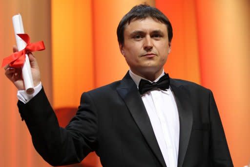 Cristian Mungiu, pictured here, who won best screenplay prize at Cannes Sunday for "Beyond The Hills", is a part of a new wave of Romanian directors that emerged after the country's communist dictator was ousted. The 44-year-old won the Palme d'Or top prize at Cannes in 2007 for the chilling abortion drama "4 Months, 3 Weeks and 2 Days", and his current film is based on a deadly exorcism