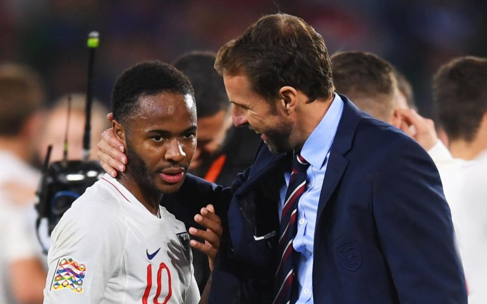 Gareth Southgate congratulates Raheem Sterling after the England forward scored twice against Spain - Getty Images Europe