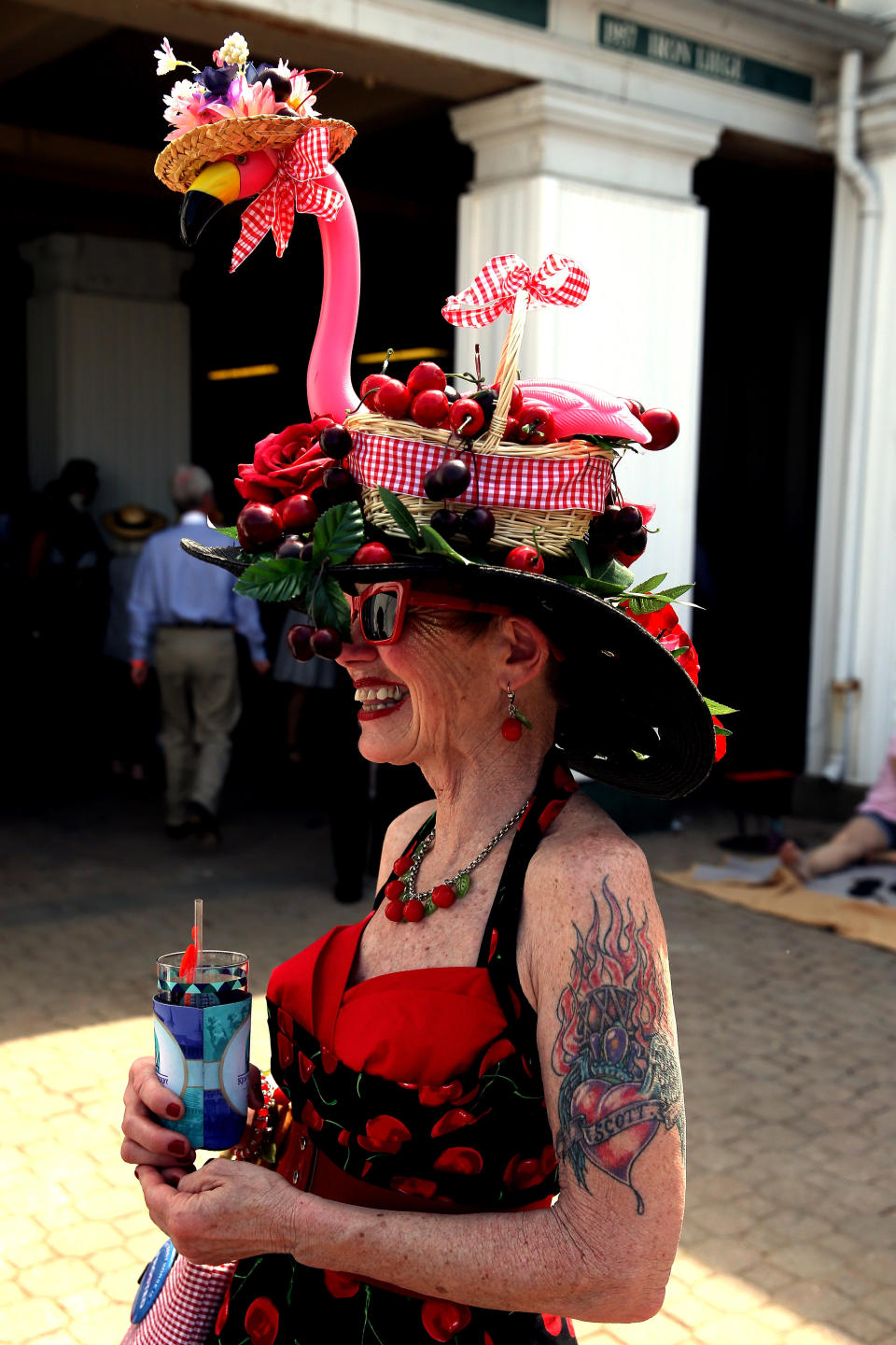 A woman wearing a festive hat looks at the 2015&nbsp;derby.