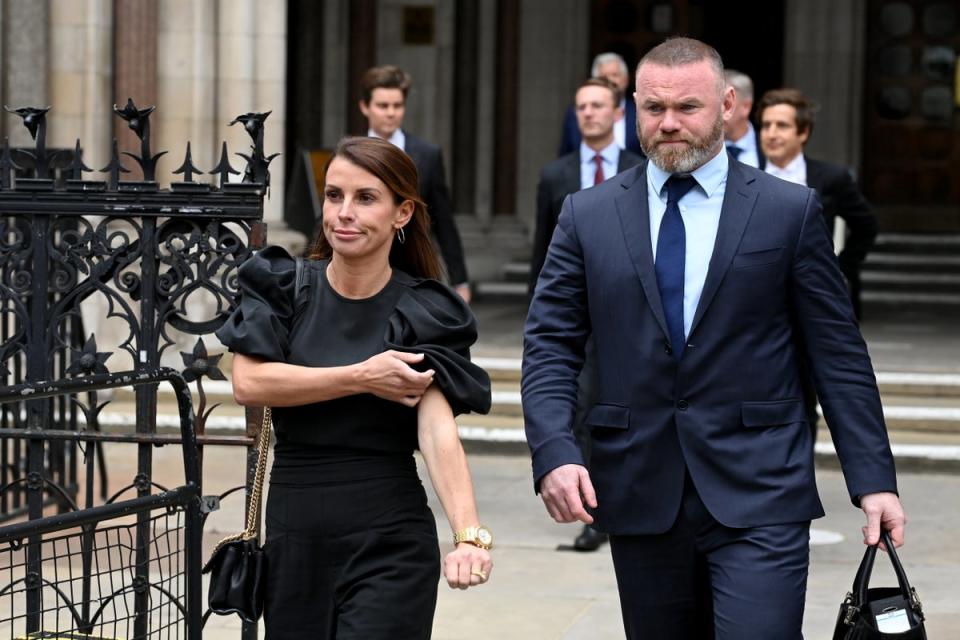 Coleen and Wayne Rooney arriving in court for the trial last year (Getty Images)