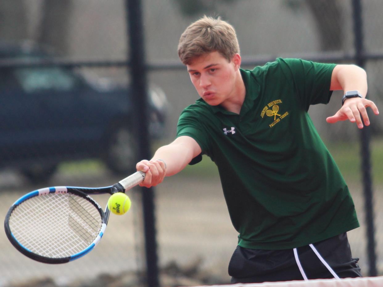 Dighton-Rehoboth's Jaems Czech returns a volley during a South Coast Conference second doubles match against Case.
