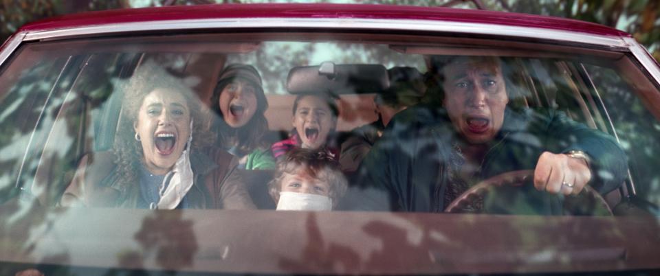 family screaming in the car