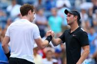 Sep 3, 2015; New York, NY, USA; Andy Murray of Great Britain (left) shakes hands with Adrian Mannarino of France after their match on day four of the 2015 U.S. Open tennis tournament at USTA Billie Jean King National Tennis Center. Mandatory Credit: Jerry Lai-USA TODAY Sports