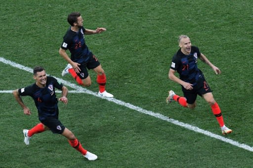 Croatia's players celebrate victory against Denmark in the last 16 of the World Cup