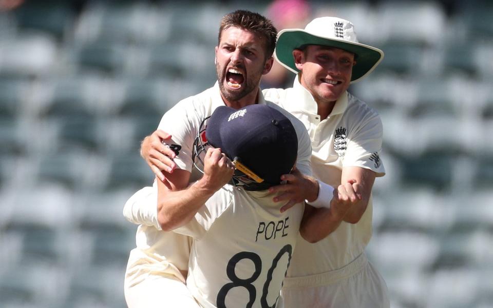 Mark Wood takes four wickets in the second innings in a man-of-the-match, match-winning performance for England - REUTERS