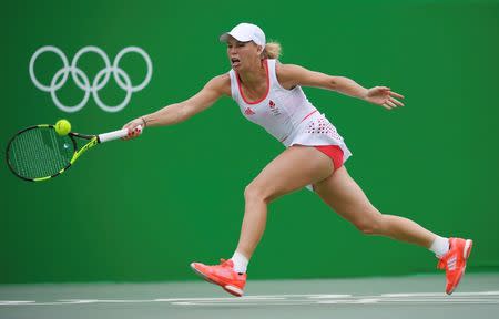 2016 Rio Olympics - Tennis - Preliminary - Women's Singles Second Round - Olympic Tennis Centre - Rio de Janeiro, Brazil - 08/08/2016. Caroline Wozniacki (DEN) of Denmark in action against Petra Kvitova (CZE) of Czech Republic. REUTERS/Toby Melville