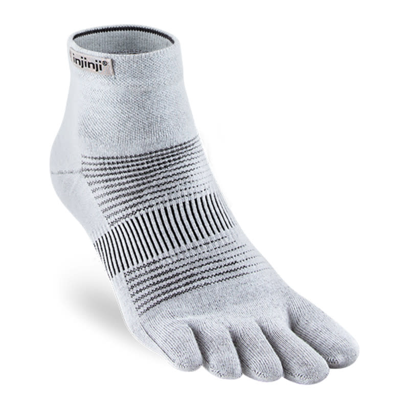 <p>Injinji</p><p>These socks are like gloves for your feet. They look funny when you first put them on, but looks don’t matter once you’ve slipped your foot into a shoe. What matters is that the separate pockets keep your toes from rubbing together and forming blisters, and give them plenty of freedom to splay and align naturally as you step. The materials feature a breathable mesh panel on the top of the foot and CoolMax EcoMade fibers throughout for wicking and ventilation. The mini-crew height sits right at the ankle and never slipped down during my testing. </p><div><table><thead><tr><th>Pros</th><th>Cons</th></tr></thead><tbody><tr><td><p>Prevents toe rubbing</p></td><td><p>Some bunching if it doesn’t fit your toes perfectly</p></td></tr></tbody></table></div><ul><li><strong>Material: </strong>62% nylon, 36% polyester, 2% spandex</li><li><strong>Sock Height: </strong>Mini Crew</li><li><strong>Cushioning:</strong> Light</li></ul><p>[$14; <a href="https://www.injinji.com/run-lightweight-mini-crew.html" rel="nofollow noopener" target="_blank" data-ylk="slk:injinji.com;elm:context_link;itc:0;sec:content-canvas" class="link ">injinji.com</a>]</p>