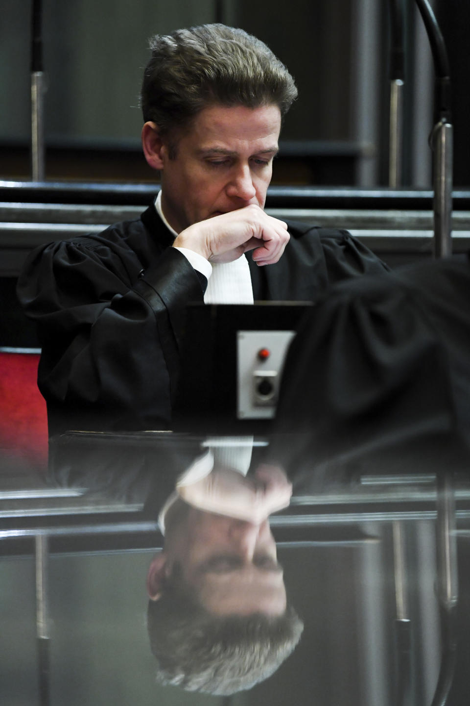 Henri Laquay, lawyer for the accused attends the trial of Mehdi Nemmouche at the Justice Palace in Brussels, Tuesday, Jan. 15, 2019. Mehdi Nemmouche is accused of shooting dead four people at a Jewish museum in Belgium in 2014. (Frederic Sierakowski, Pool Photo via AP)