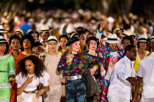 Models dancing in the streets after the runway presentation at the Paseo del Prado street in Havana, Cuba. (Photo: Rex)