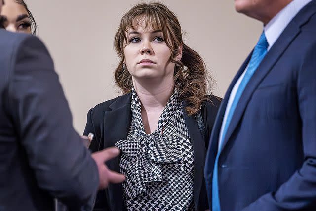 <p>Jim Weber - Pool/Getty</p> Hannah Gutierrez Reed talks to her defense team during her involuntary manslaughter trial