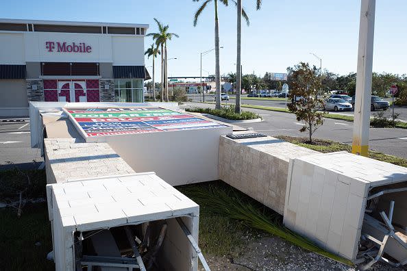 A fallen sign following Hurricane Ian in Venice, Florida, US, on Thursday, Sept. 29, 2022. Ian, now a hurricane again, is threatening to carve a new path of destruction through South Carolina Friday when it roars ashore north of Charleston. Photographer: Tristan Wheelock/Bloomberg via Getty Images