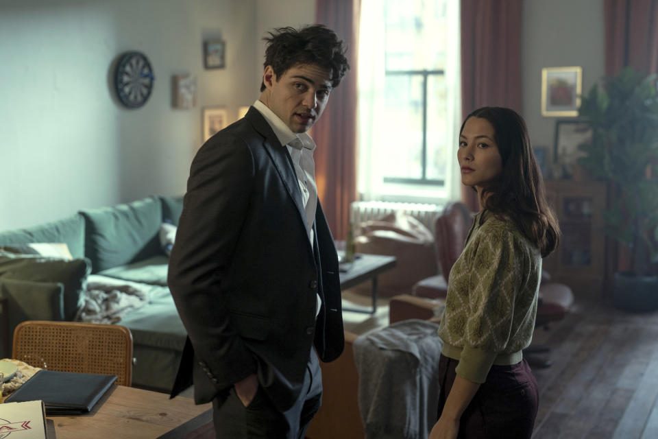 This image released by Netflix shows Noah Centineo as Owen Hendricks, left, and Fivel Stewart as Hannah Copeland in a scene from the series "The Recruit." (Philippe Bossé/Netflix via AP)