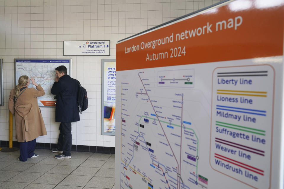 A sign for the new Windrush line which was unveiled by Mayor of London Sadiq Khan in London Thursday, Feb. 15, 2024. London Overground services will be split into separate lines, which will be given individual names and colours to make the network easier to navigate. The six lines will be named Lioness, Mildmay, Windrush, Weaver, Suffragette and Liberty. (Jonathan Brady/PA via AP)