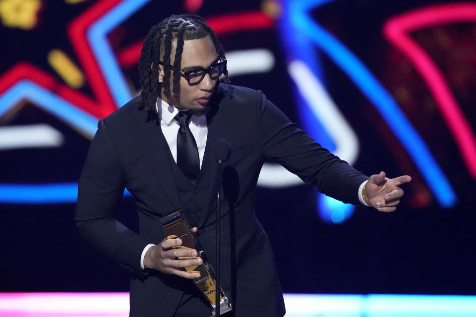 Houston Texans' C.J. Stroud, AP offensive rookie of the year speaks during the NFL Honors award show ahead of the Super Bowl 58 football game Thursday, Feb. 8, 2024, in Las Vegas. The San Francisco 49ers face the Kansas City Chiefs in Super Bowl 58 on Sunday. (AP Photo/David J. Phillip)
