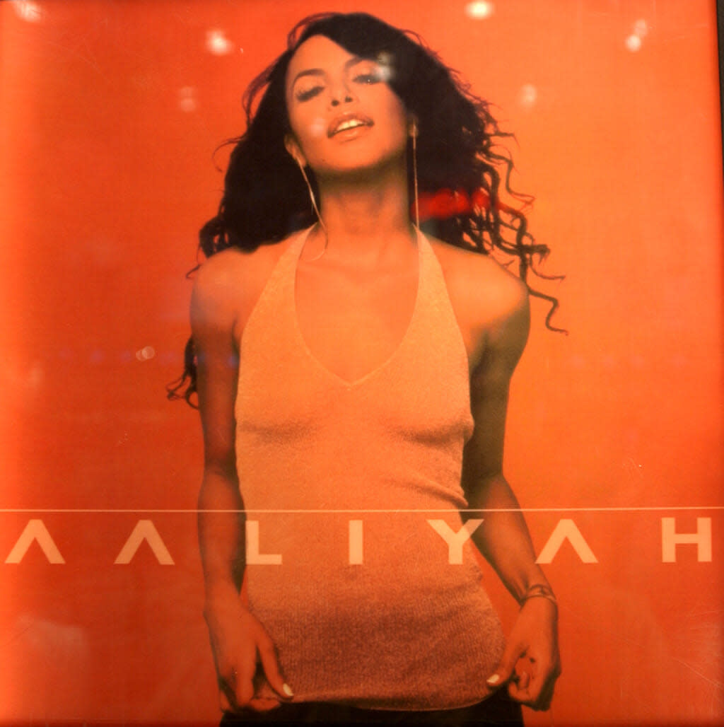 The album cover of singer and actress Aaliyah’s second, self-titled release is on display at a listening station August 27, 2001 at a Virgin Megastore in New York City. (Photo by Spencer Platt/Getty Images)