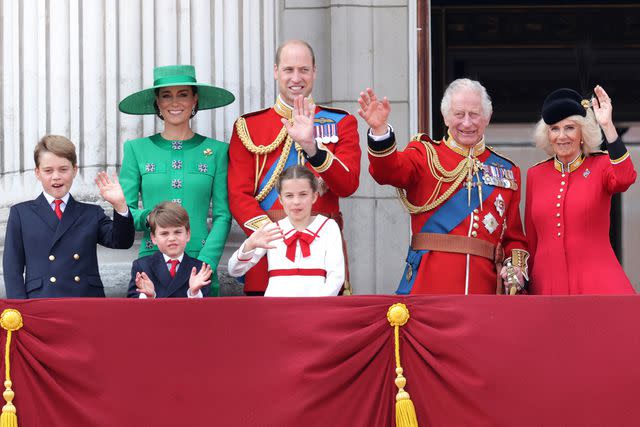 <p>Chris Jackson/Getty </p> King Charles and Queen Camilla wave alongside Prince William and Kate Middleton with their kids on the Buckingham Palace balcony during Trooping the Colour 2023