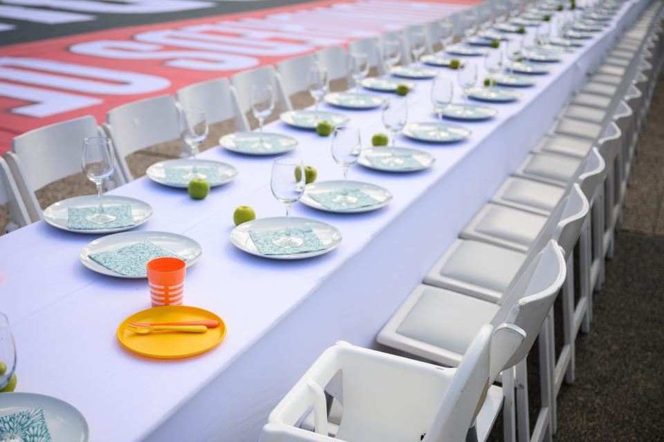 A child's dinner set is seen among other place settings as a "Shabbat Dinner" table on Oct. 20, 2023 in Tel Aviv, is prepared at the Tel Aviv museum plaza, with 200 empty seats, representing the hostages and missing people after the Hamas attacks on October 7, 2023.