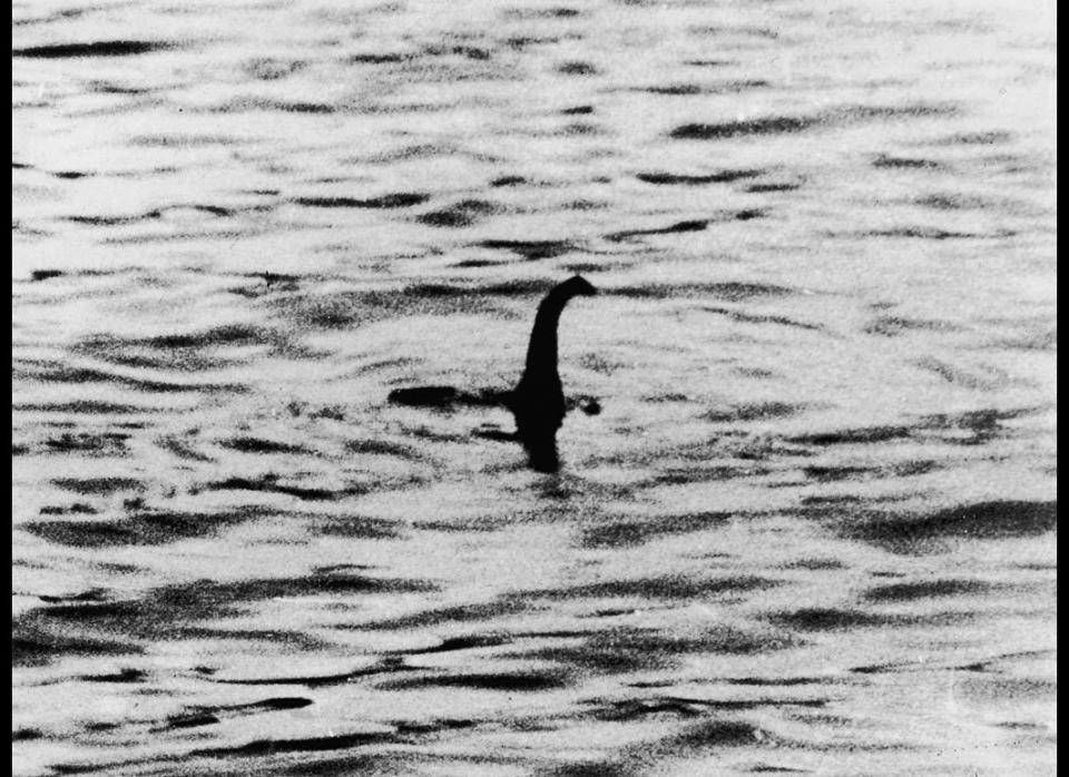 A view of the Loch Ness Monster, near Inverness, Scotland, on April 19, 1934. The photograph, one of two pictures known as the "surgeon's photographs," was allegedly taken by Col. Robert Kenneth Wilson, though it was later exposed as a hoax by one of the participants, Chris Spurling. On his deathbed, Spurling revealed that the pictures were staged by himself, Marmaduke and Ian Wetherell, and Wilson. References to a monster in Loch Ness date back to St. Columba's biography in 565 A.D. More than 1,000 people claim to have seen "Nessie," and the area is, consequently, a popular tourist attraction.