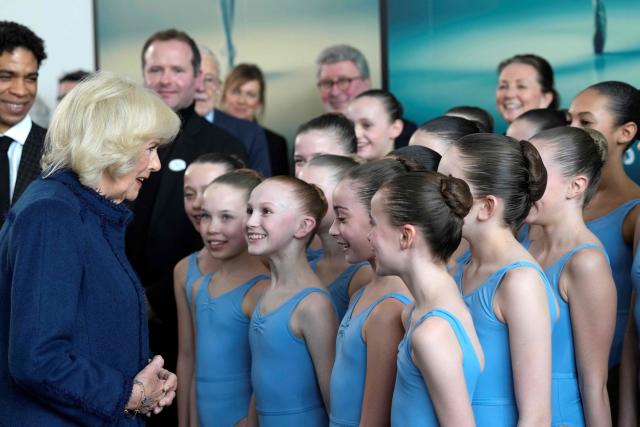 Camilla, Queen Consort speaks with students during her visit to the Elmhurst Ballet School to celebrate the school’s centenary, in Birmingham (POOL/AFP via Getty Images)