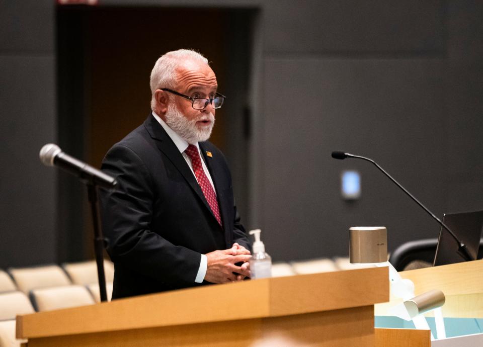 Candidate Richard Carr answers questions from the council as they seek to fill the vacant District 4 seat during a city council meeting at Cape Coral City Hall in Cape Coral on Wednesday, Dec. 13, 2023.