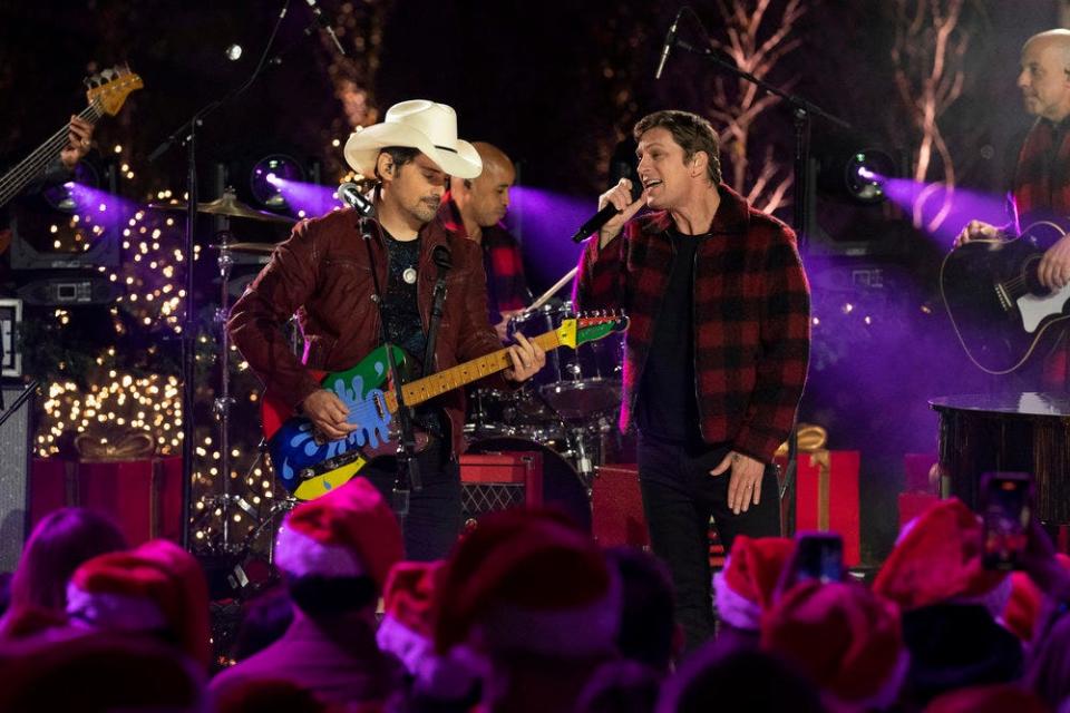 (L-R) Brad Paisley and Rob Thomas performing during "Christmas In Rockefeller Center."