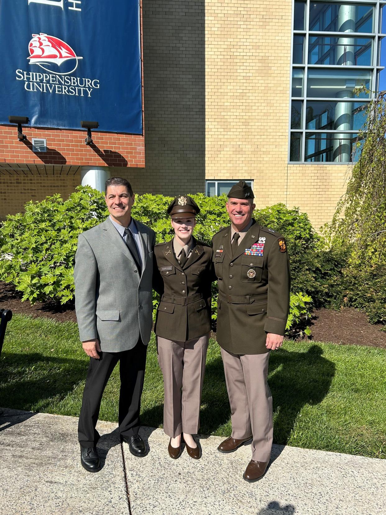 From left to right: Greg Maresca, 2nd Lt. Maria Maresca and MGen. Andy Munera