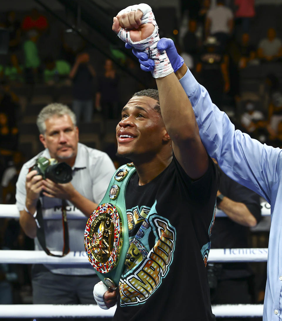 Devin Haney celebrates after defeating Jorge Linares by unanimous decision in the WBC lightweight title boxing match Saturday, May 29, 2021, in Las Vegas. (AP Photo/Chase Stevens)