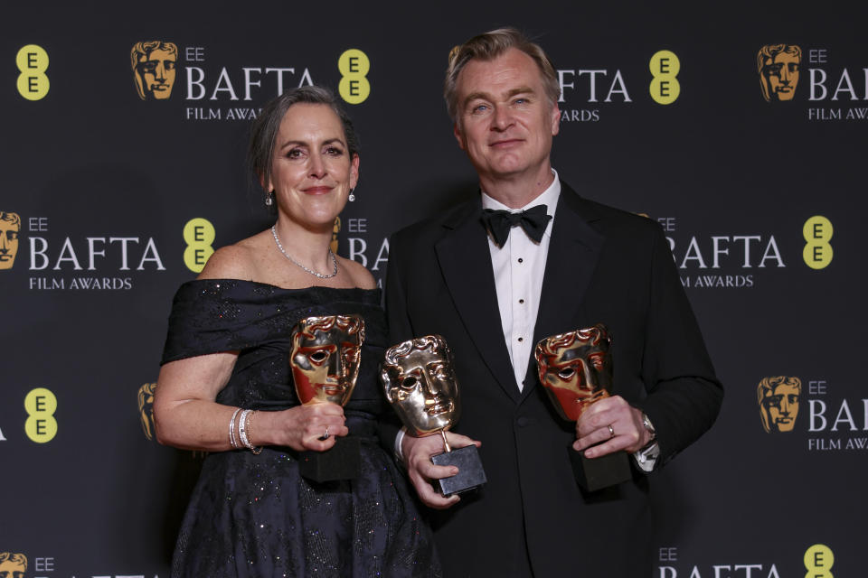 Producer Emma Thomas, left, and director Christopher Nolan, winner of the best film award and director award for 'Oppenheimer', pose for photographers at the 77th British Academy Film Awards, BAFTA's, in London, Sunday, Feb. 18, 2024. (Photo by Vianney Le Caer/Invision/AP)